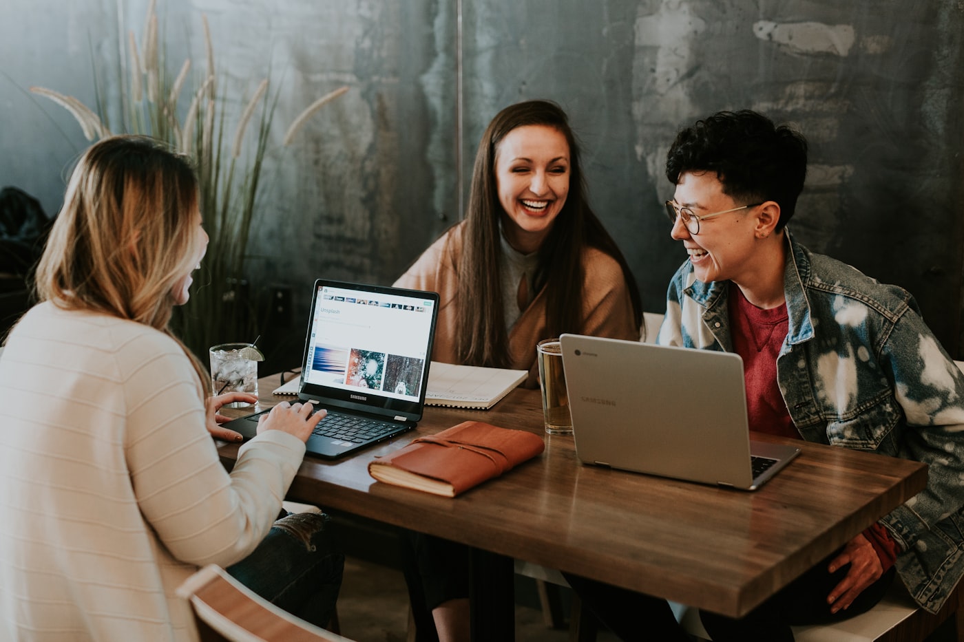 A diverse group working together around a shared table